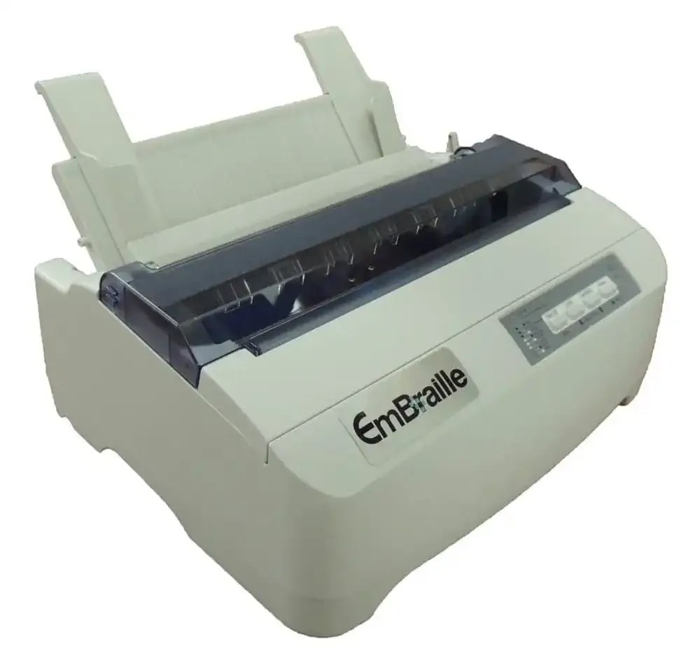 Braille printer with paper feed tray.