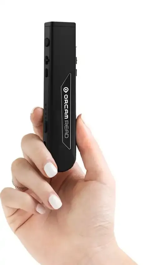 Hand holding a black reading device
