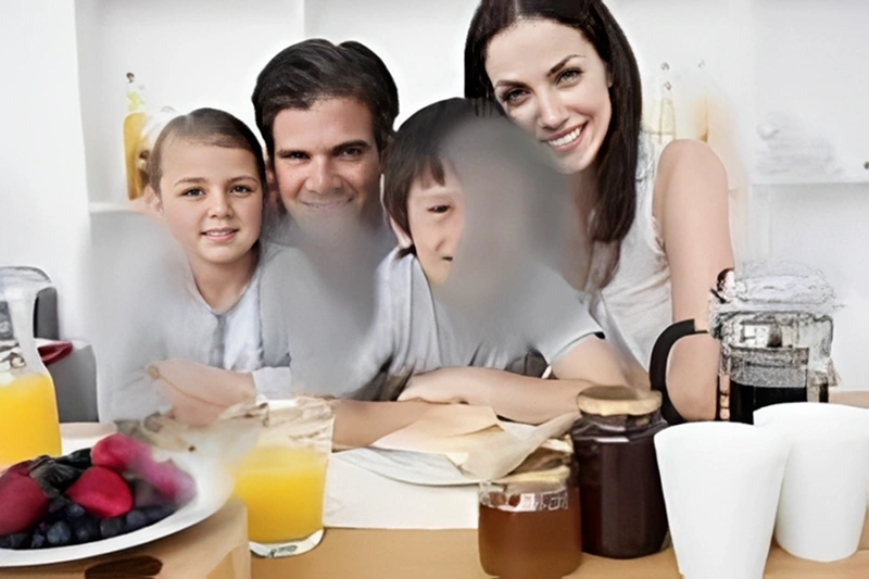 Family breakfast with juice and fruit