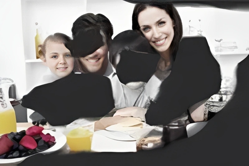 Family enjoying breakfast together