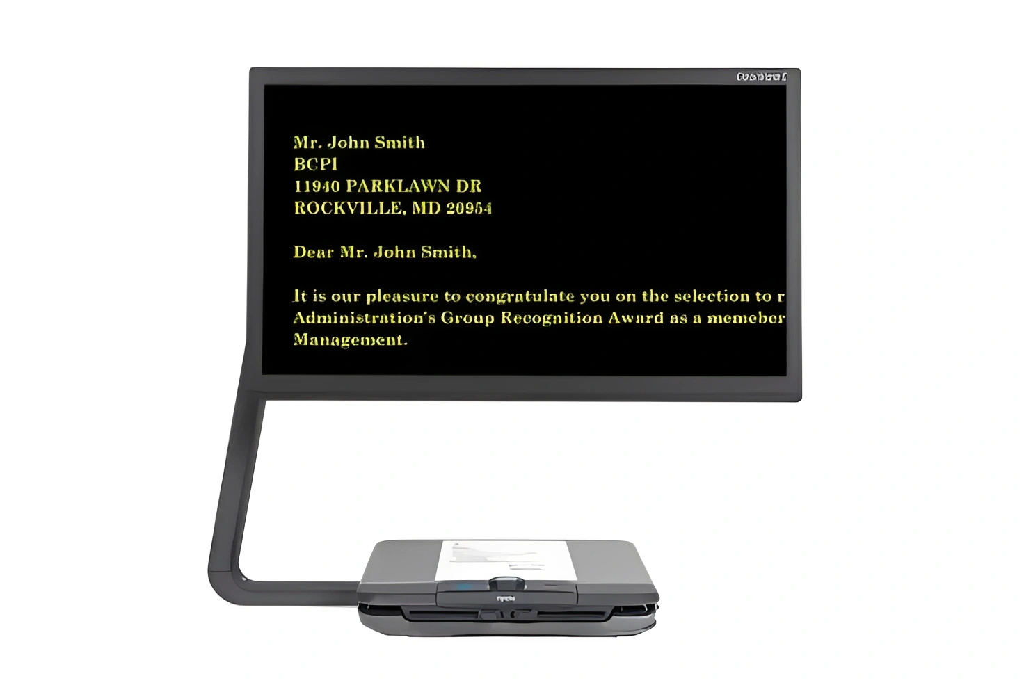 Electronic magnifier displaying text on screen.
