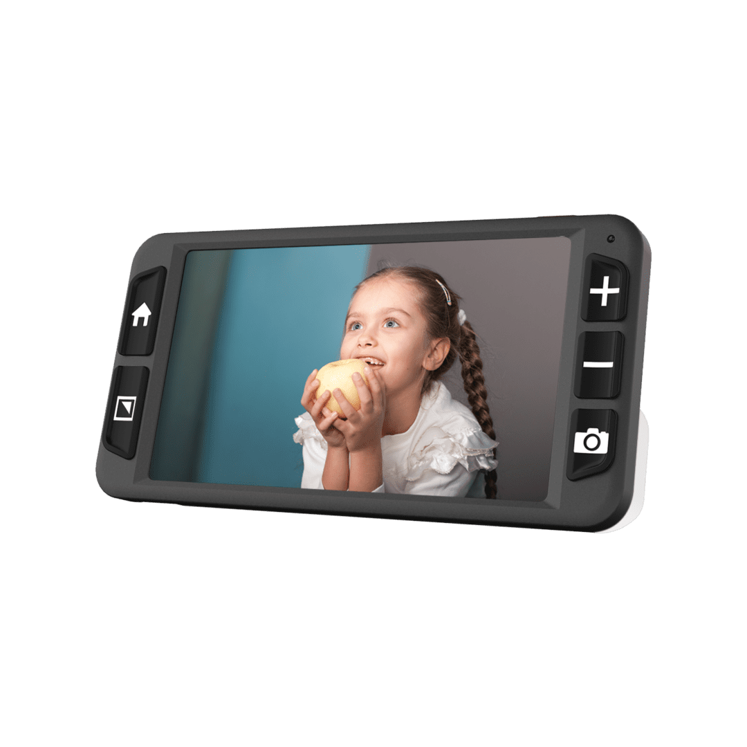 Girl holding apple on digital camera screen.
