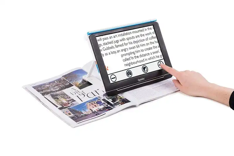 Electronic magnifier used on a magazine page.