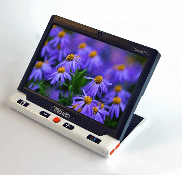 Electronic magnifier displaying purple flowers on screen.