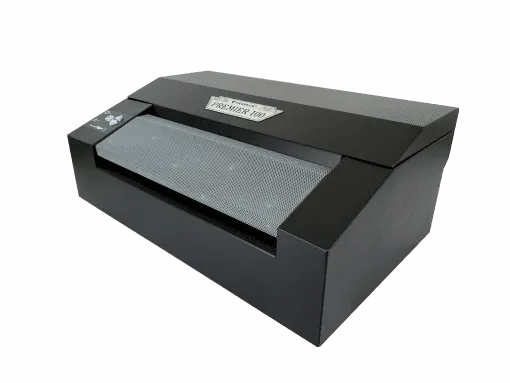 Black desktop thermal printer on black background.
